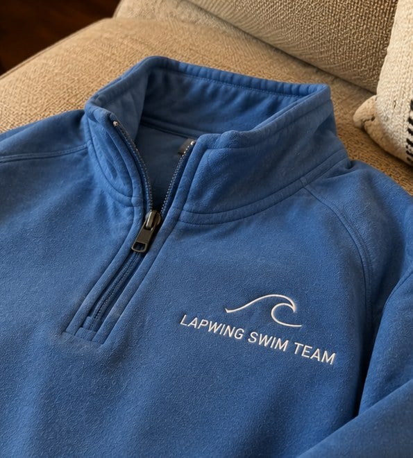 Customer photo of a custom youth quarter zip